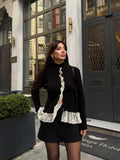 Black and white cardigan with Ruffles